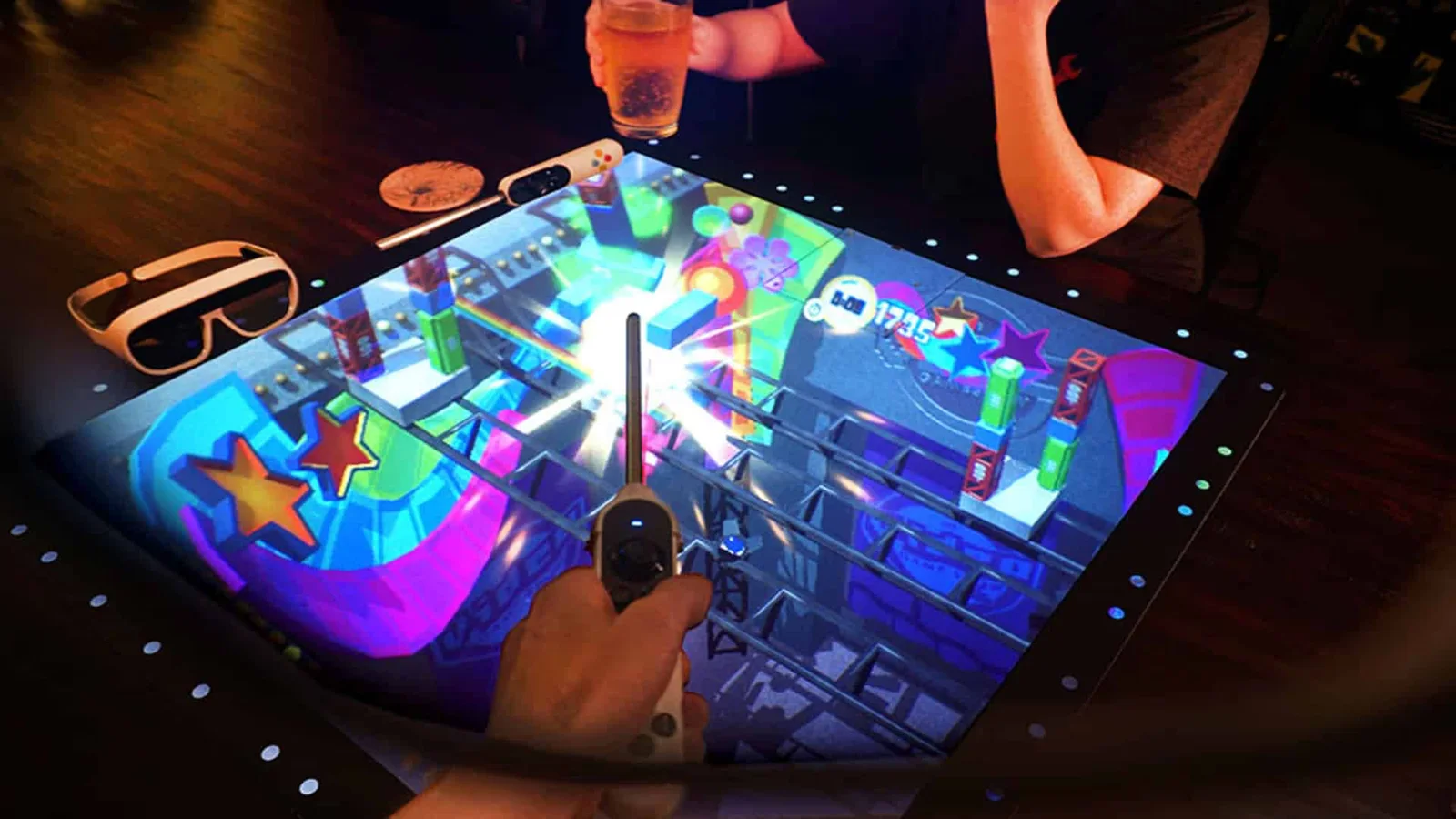Colourful holographic tabletop game viewed through Tilt Five